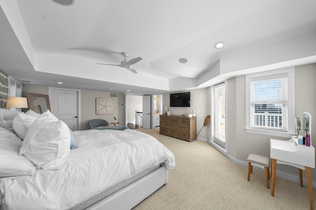 bedroom featuring light carpet, baseboards, a ceiling fan, and recessed lighting