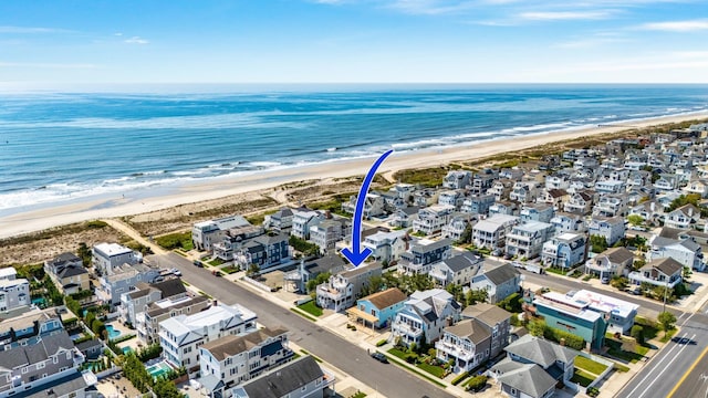 aerial view of residential area with extended coastline