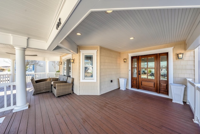 wooden terrace with a porch