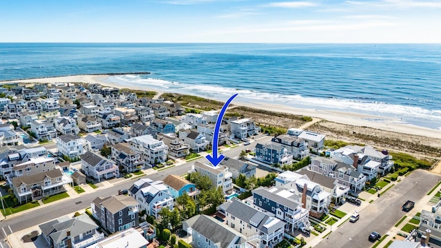 aerial perspective of suburban area featuring extended coastline