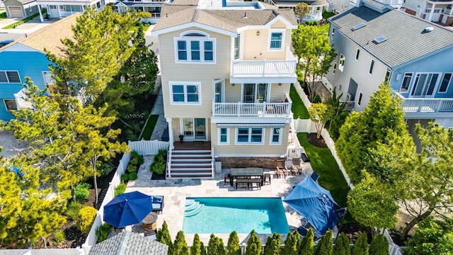 aerial view of residential area with a pool