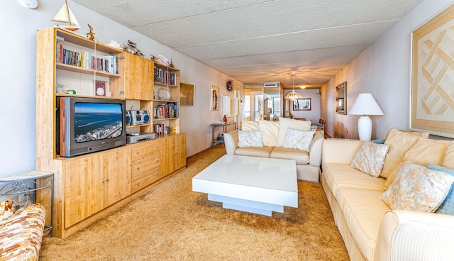 living area featuring light carpet