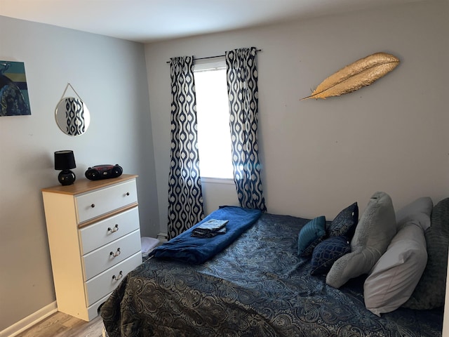 84018403 New Jersey Ave, Wildwood Crest, NJ 08260 - bedroom featuring multiple windows and light wood-type flooring