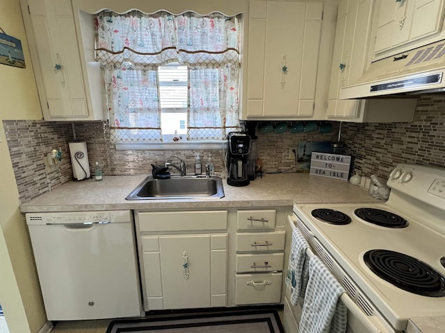 kitchen featuring sink, white cabinets, backsplash, and white appliances