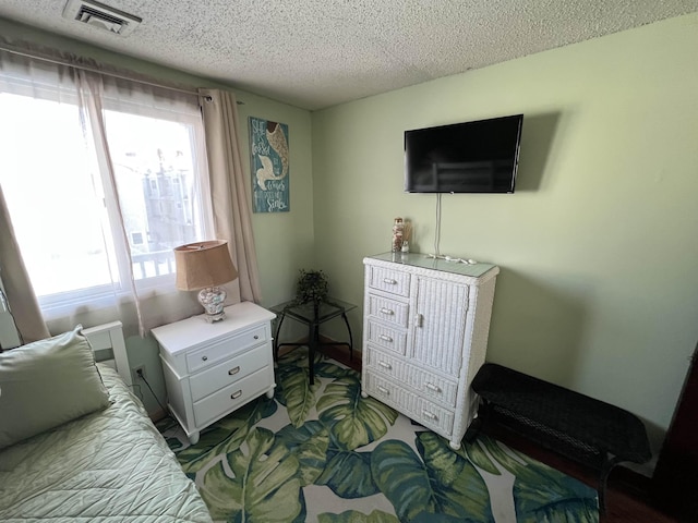 bedroom with a textured ceiling