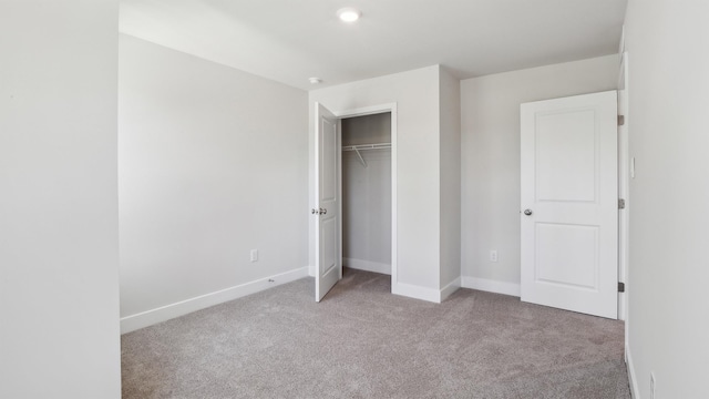 845 Broadway Unit 1, West Cape May, NJ 08204 - unfurnished bedroom featuring carpet, baseboards, and a closet