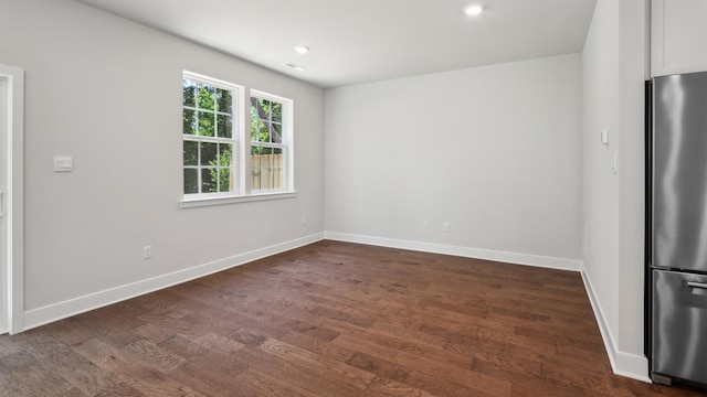 845 Broadway Unit 1, West Cape May, NJ 08204 - empty room featuring baseboards, dark wood-type flooring, and recessed lighting
