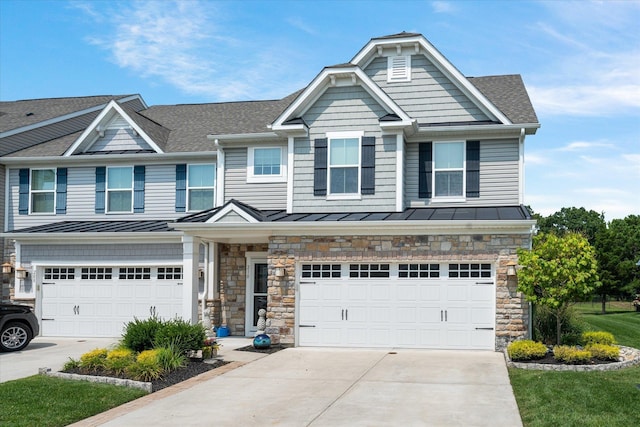 view of front of property featuring a garage