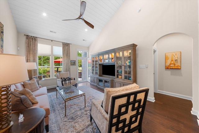 living room featuring high vaulted ceiling, ceiling fan, dark wood-type flooring, and wood ceiling