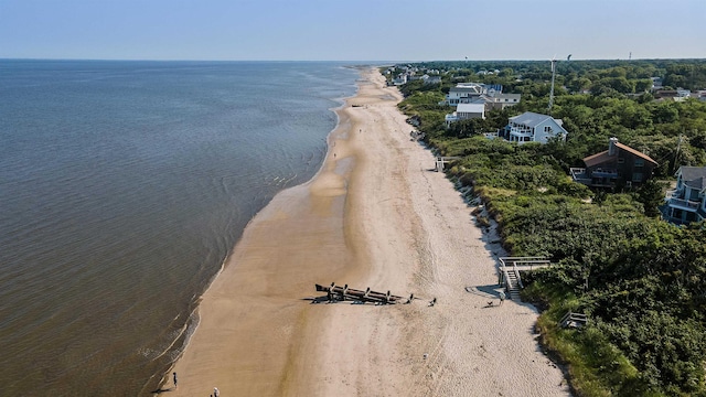 aerial view featuring a water view and a view of the beach