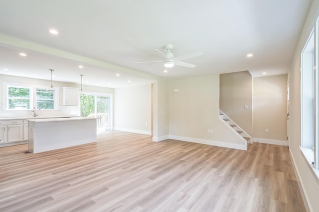 80 W Rising Sun Dr, Ocean View, NJ 08230 - unfurnished living room with recessed lighting, light wood-style flooring, stairway, and ceiling fan
