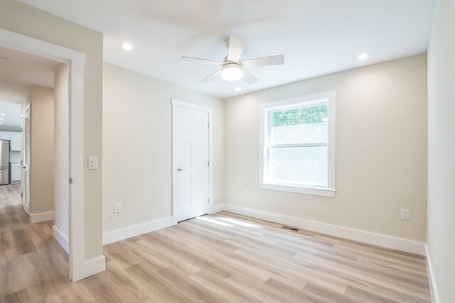 80 W Rising Sun Dr, Ocean View, NJ 08230 - unfurnished bedroom featuring light wood-style flooring, freestanding refrigerator, recessed lighting, and ceiling fan