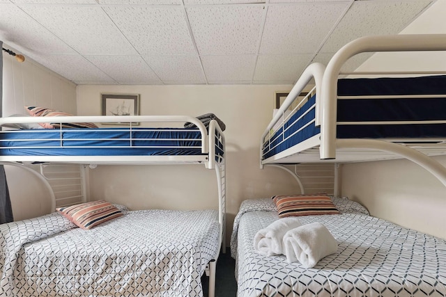 bedroom featuring a drop ceiling