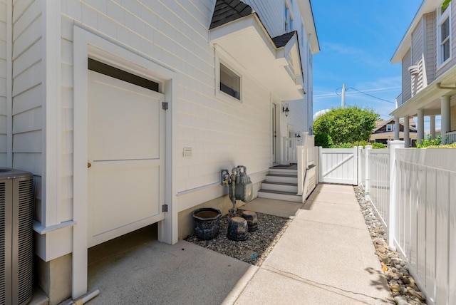 property entrance featuring central AC