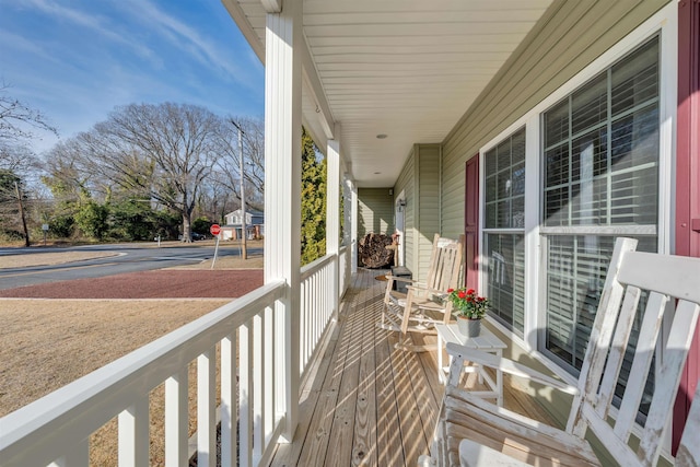 balcony featuring covered porch