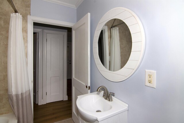 30 Pinetree Dr, Villas, NJ 08251 - full bathroom with a sink, ornamental molding, a shower with shower curtain, and wood finished floors