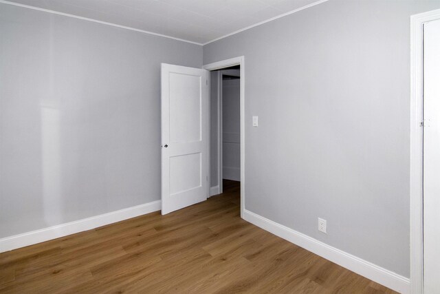 30 Pinetree Dr, Villas, NJ 08251 - unfurnished room with baseboards, light wood-type flooring, and crown molding