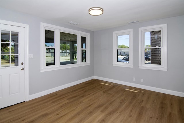 30 Pinetree Dr, Villas, NJ 08251 - unfurnished room featuring plenty of natural light, baseboards, and wood finished floors