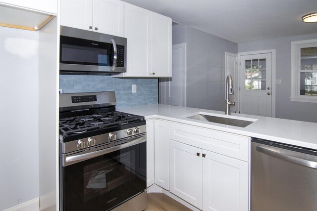 30 Pinetree Dr, Villas, NJ 08251 - kitchen featuring stainless steel appliances, a sink, backsplash, and light countertops