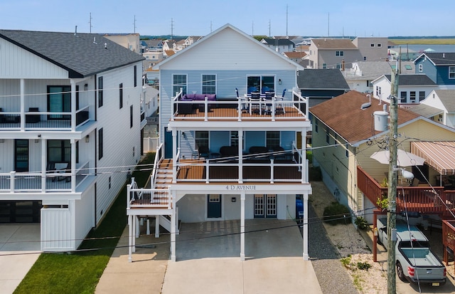 rear view of house featuring a residential view