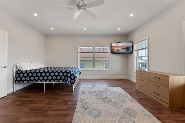 bedroom featuring ceiling fan, baseboards, dark wood-type flooring, and recessed lighting