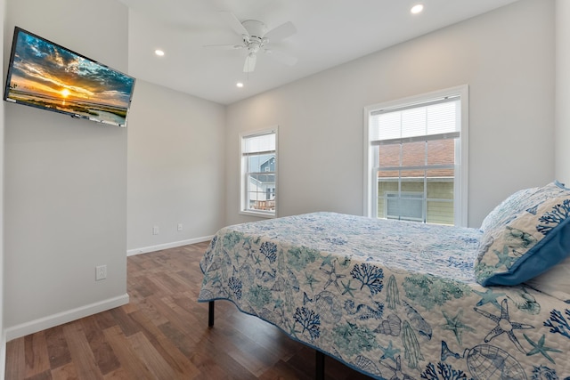 bedroom with a ceiling fan, recessed lighting, baseboards, and wood finished floors