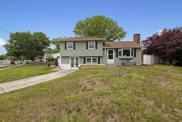 121 Roslyn Ave, North Cape May, NJ 08204 - tri-level home with french doors, a chimney, and entry steps