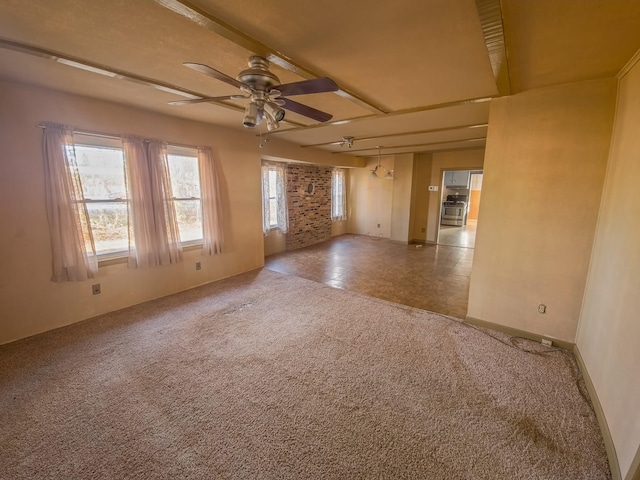 carpeted empty room with ceiling fan