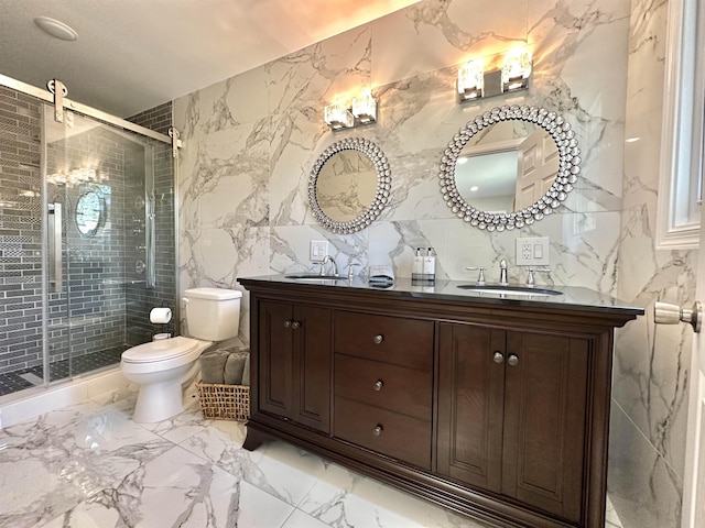 bathroom featuring vanity, toilet, a shower with shower door, and tile walls