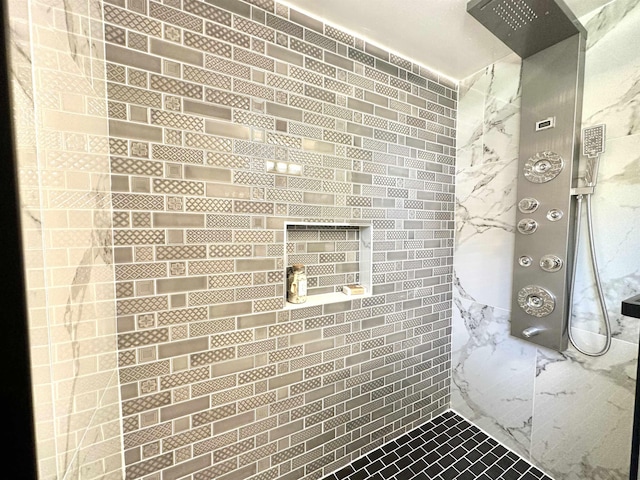 bathroom featuring tiled shower