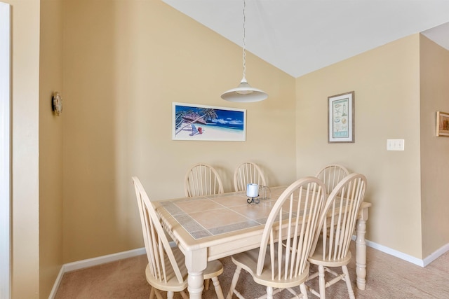 328 E 25th Ave Unit C, North Wildwood, NJ 08260 - dining area featuring carpet flooring and vaulted ceiling