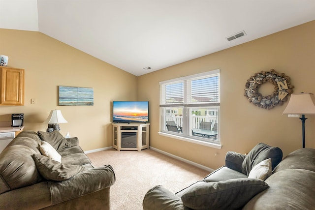 328 E 25th Ave Unit C, North Wildwood, NJ 08260 - living room featuring vaulted ceiling and light carpet