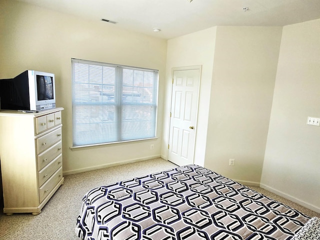 unfurnished bedroom with light carpet