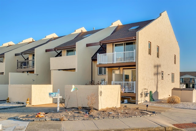 exterior space with a balcony