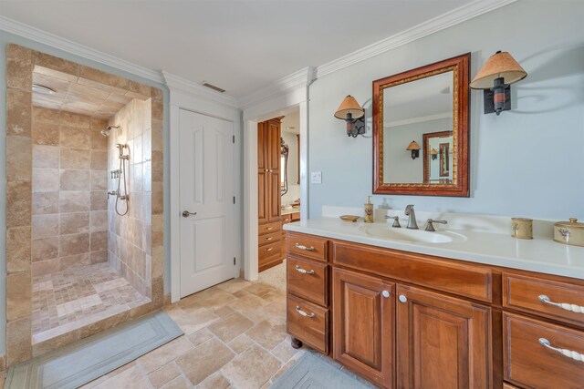 56 E 22nd St, Avalon, NJ 08202 - full bath with vanity, tiled shower, crown molding, and stone finish floors