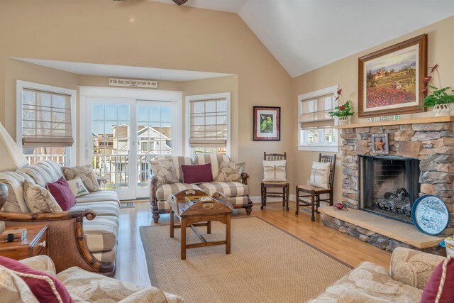 56 E 22nd St, Avalon, NJ 08202 - living room with a fireplace, wood finished floors, and high vaulted ceiling