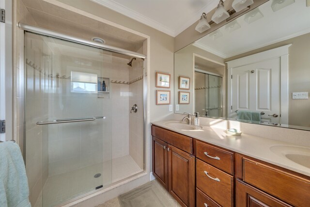 56 E 22nd St, Avalon, NJ 08202 - full bathroom featuring a stall shower, double vanity, ornamental molding, and tile patterned flooring