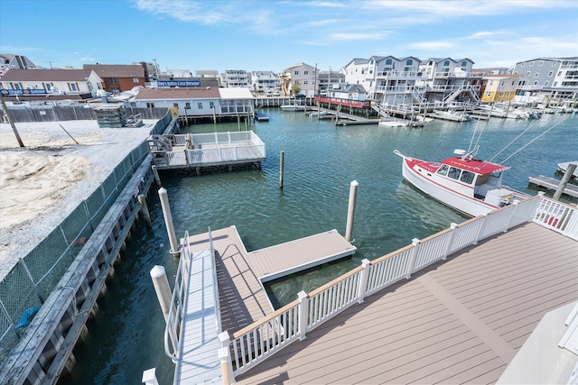 310 42nd Pl Unit 201E, Sea Isle City, NJ 08243 - view of dock featuring a water view and a residential view