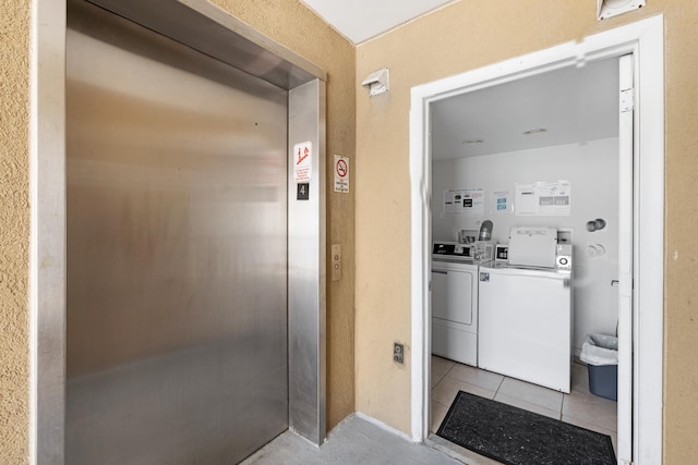 8401 Atlantic Ave # 405, Wildwood Crest, NJ 08260 - washroom with independent washer and dryer, elevator, and light tile patterned floors