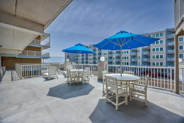8401 Atlantic Ave # 405, Wildwood Crest, NJ 08260 - view of patio with outdoor dining area