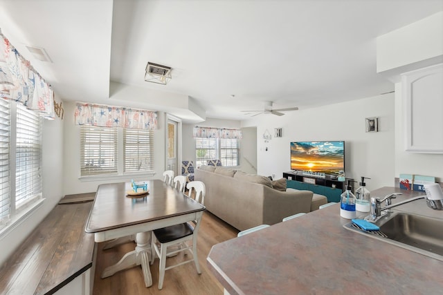 316 E 17th Ave Unit 6, North Wildwood, NJ 08260 - dining space featuring light wood-type flooring and ceiling fan