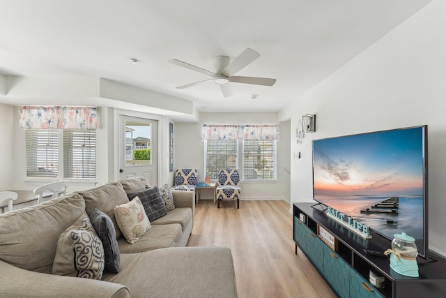 316 E 17th Ave Unit 6, North Wildwood, NJ 08260 - living room featuring a ceiling fan and light wood-style flooring