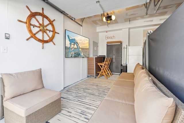 316 E 17th Ave Unit 6, North Wildwood, NJ 08260 - living room featuring a garage
