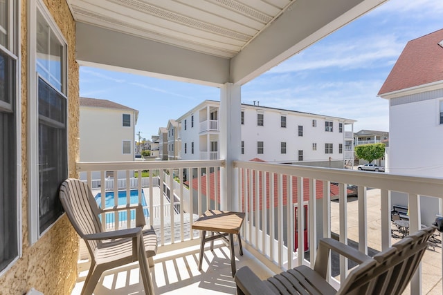 316 E 17th Ave Unit 6, North Wildwood, NJ 08260 - balcony with a residential view and view of pool area