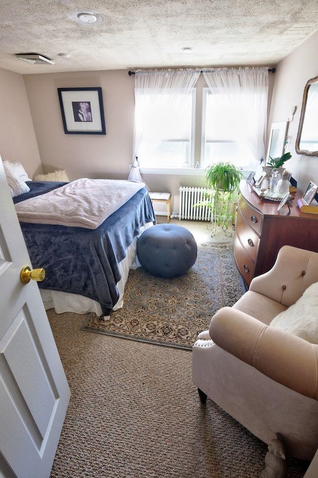 14 Lyndhurst Rd, Marmora, NJ 08223 - bedroom with radiator, carpet floors, and a textured ceiling