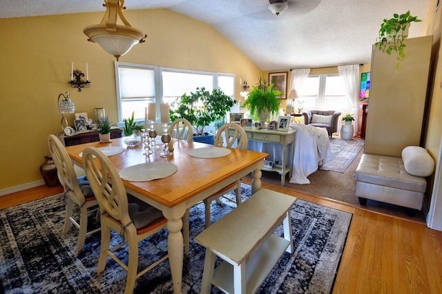 14 Lyndhurst Rd, Marmora, NJ 08223 - dining area featuring lofted ceiling, wood finished floors, and a textured ceiling