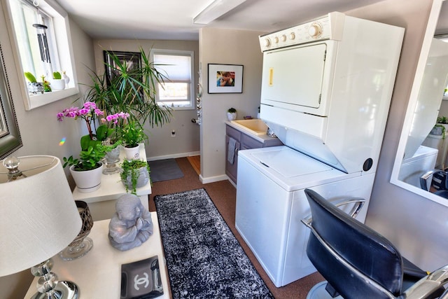 14 Lyndhurst Rd, Marmora, NJ 08223 - laundry area featuring stacked washer and clothes dryer and baseboards
