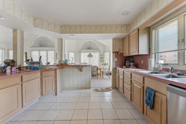 138 8th St, Avalon, NJ 08202 - kitchen featuring dishwasher, plenty of natural light, and light tile patterned floors