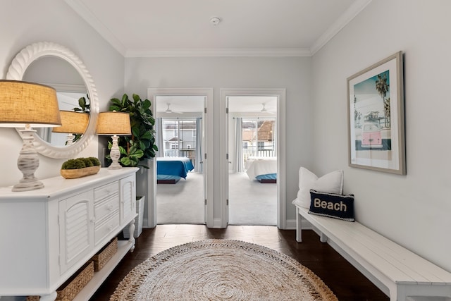 corridor featuring dark hardwood / wood-style floors and ornamental molding