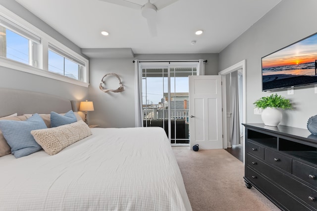 bedroom with carpet flooring, access to outside, and ceiling fan